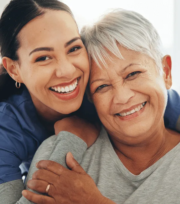 Caregiver assisting elderly person